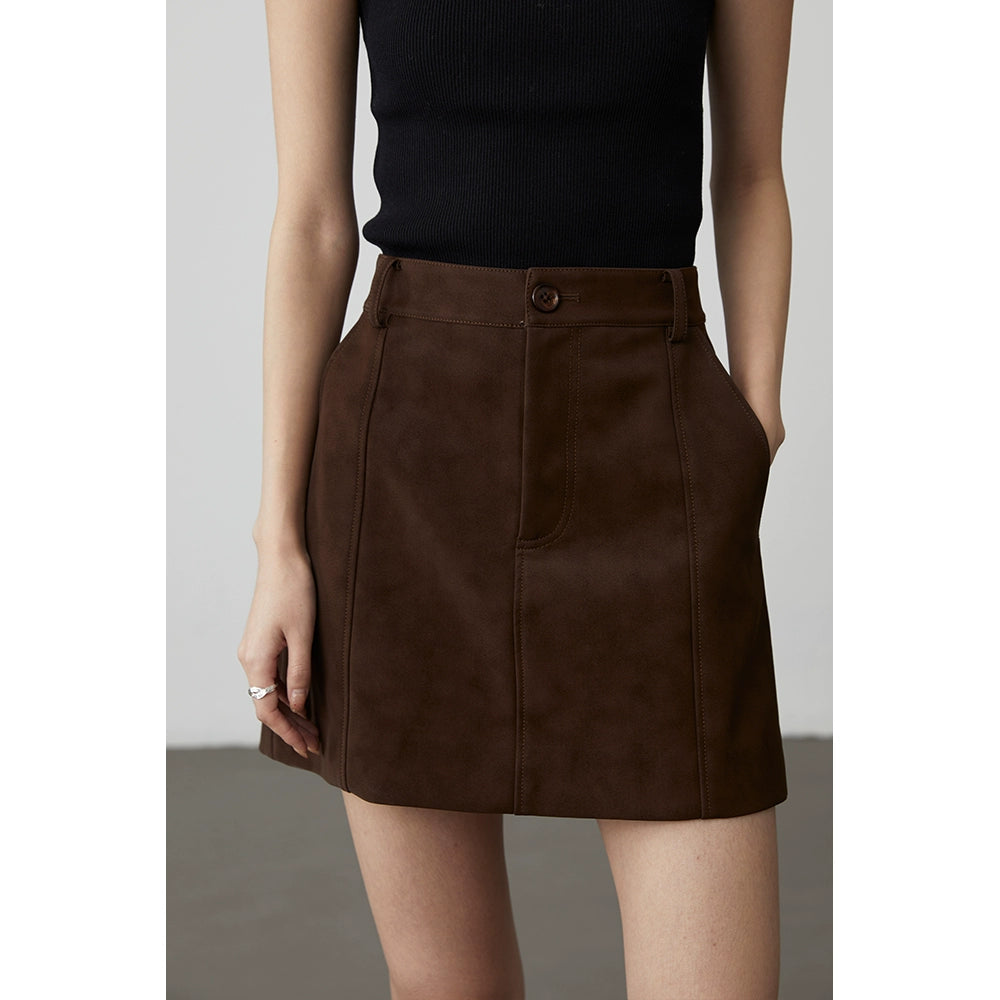 CAREMIND black coffee two-color urban modern texture small leather skirt anti-light design PU short skirt a-word skirt